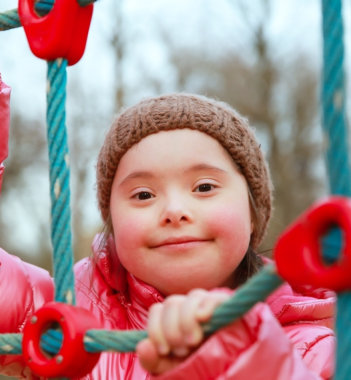 a mentally disabled child climbing